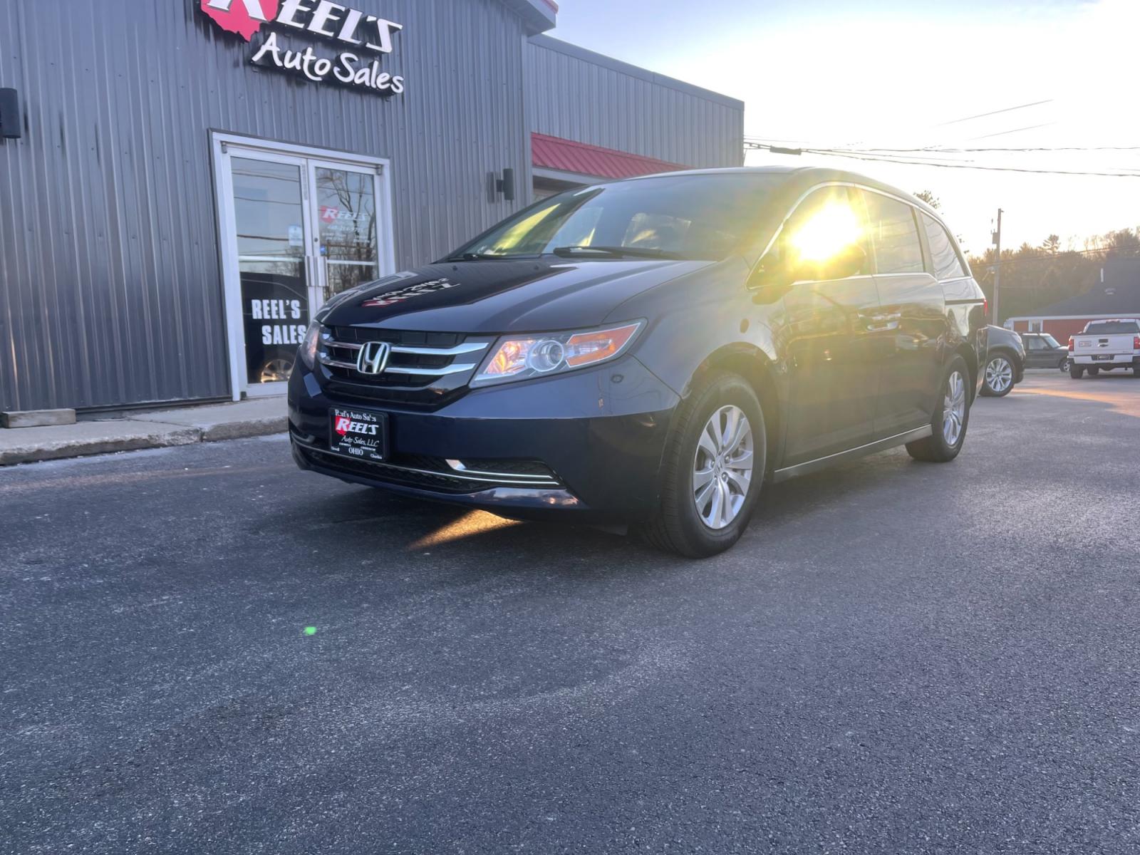 2015 Blue /Gray Honda Odyssey EX-L (5FNRL5H64FB) with an 3.5L V6 SOHC 24V engine, 6-Speed Automatic transmission, located at 11115 Chardon Rd. , Chardon, OH, 44024, (440) 214-9705, 41.580246, -81.241943 - This 2015 Honda Odyssey EX-L offers a luxurious and convenient driving experience, boasting a premium leather interior and sound system, enhancing comfort and entertainment on the go. Its safety and functional features, such as a backup camera, Honda Lane Watch, lane departure warning, and forward c - Photo #0